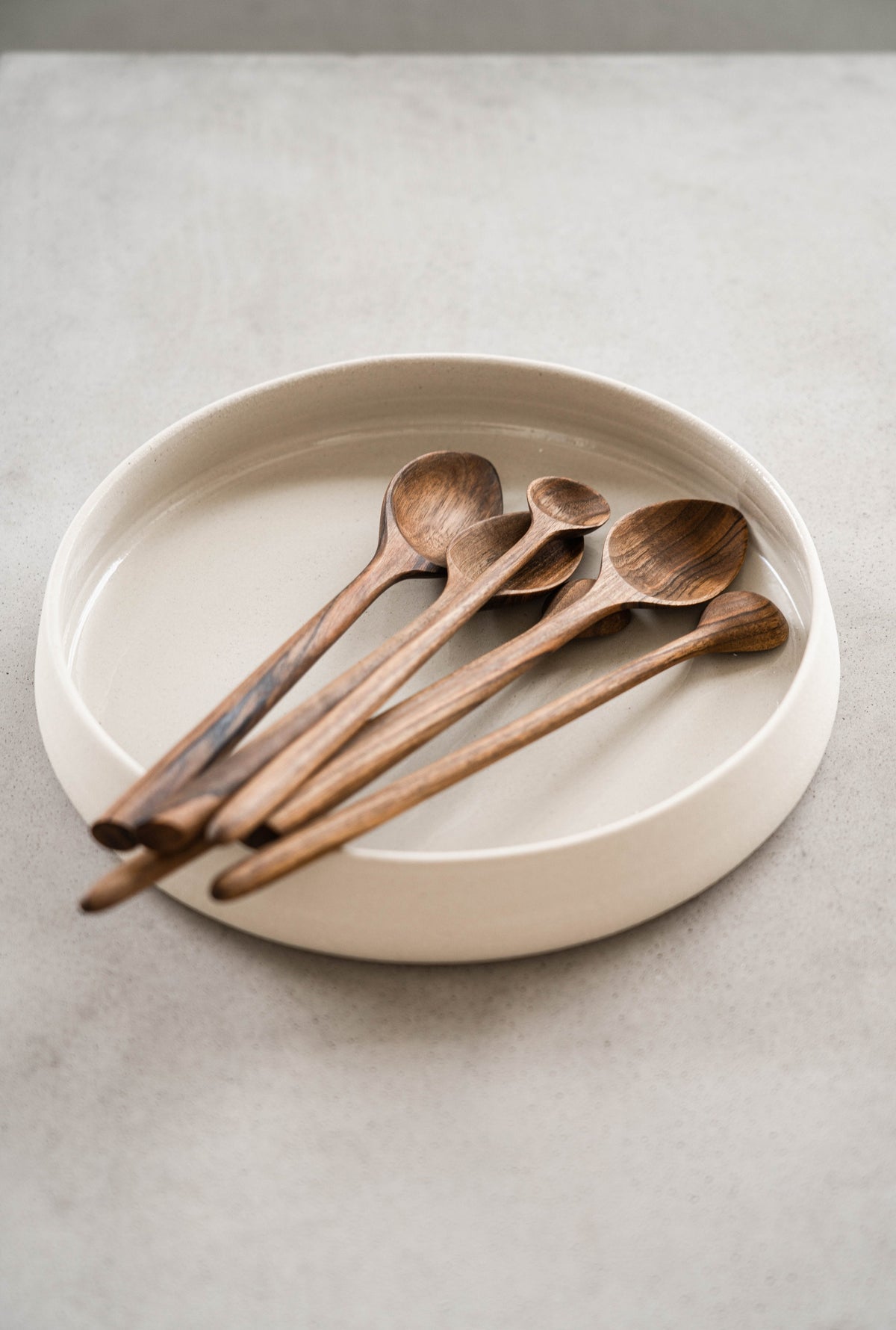 Handmade stoneware dinner plates with high sides and transparent glaze, rustic textured ceramicware from Ukraine