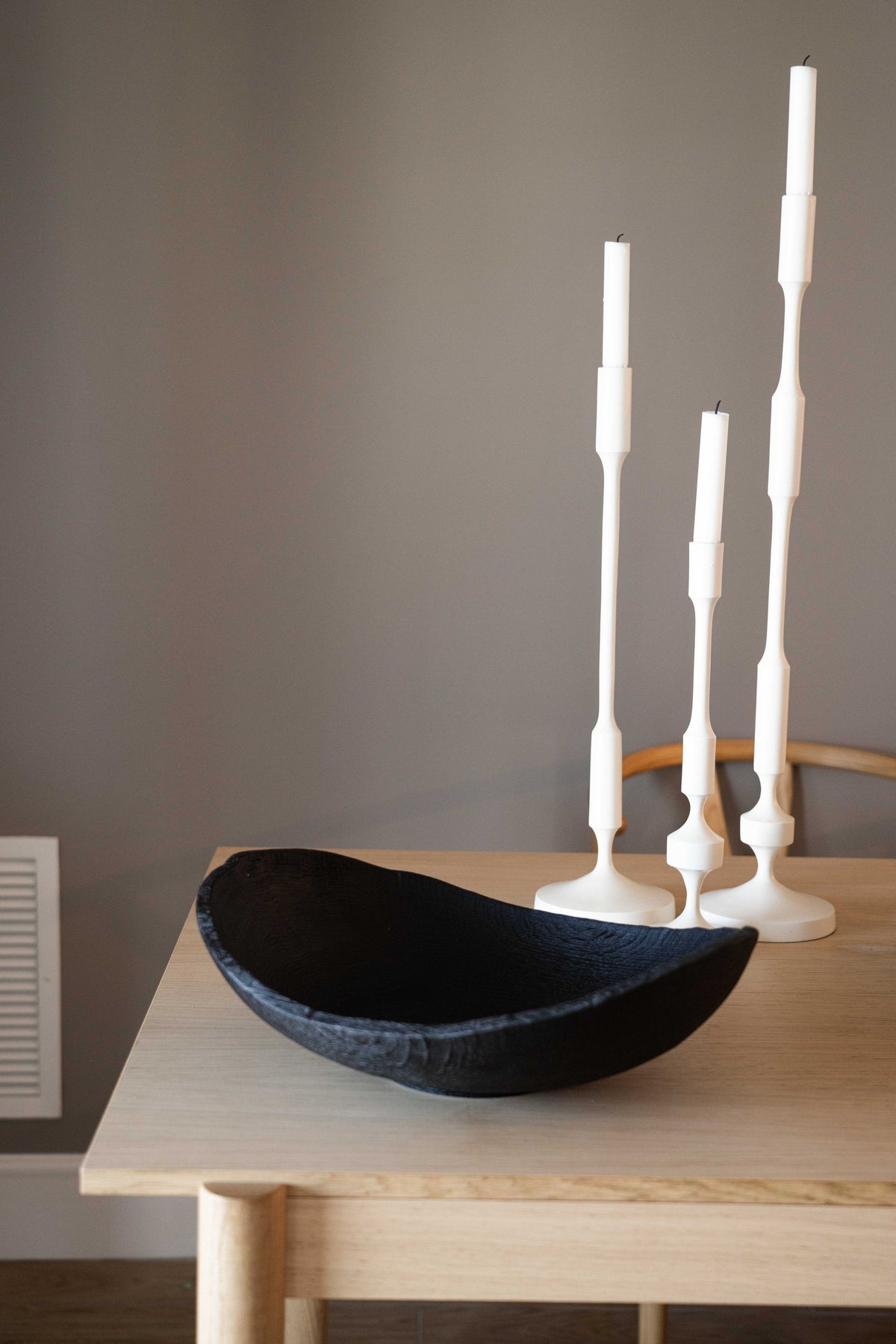 Hand-carved large charred wood shallow bowl made from ash wood with rustic ripped edges