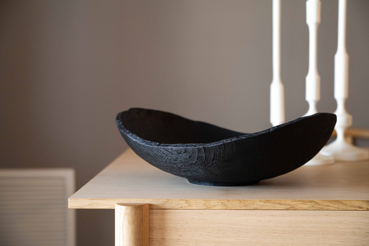 Hand-carved large charred wood shallow bowl made from ashwood with rustic ripped edges