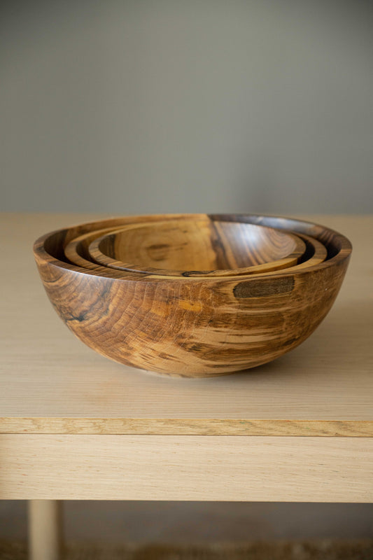 Hand carved walnut wood nesting bowl set with three sizes, handmade in Ukraine and finished with food-safe oil