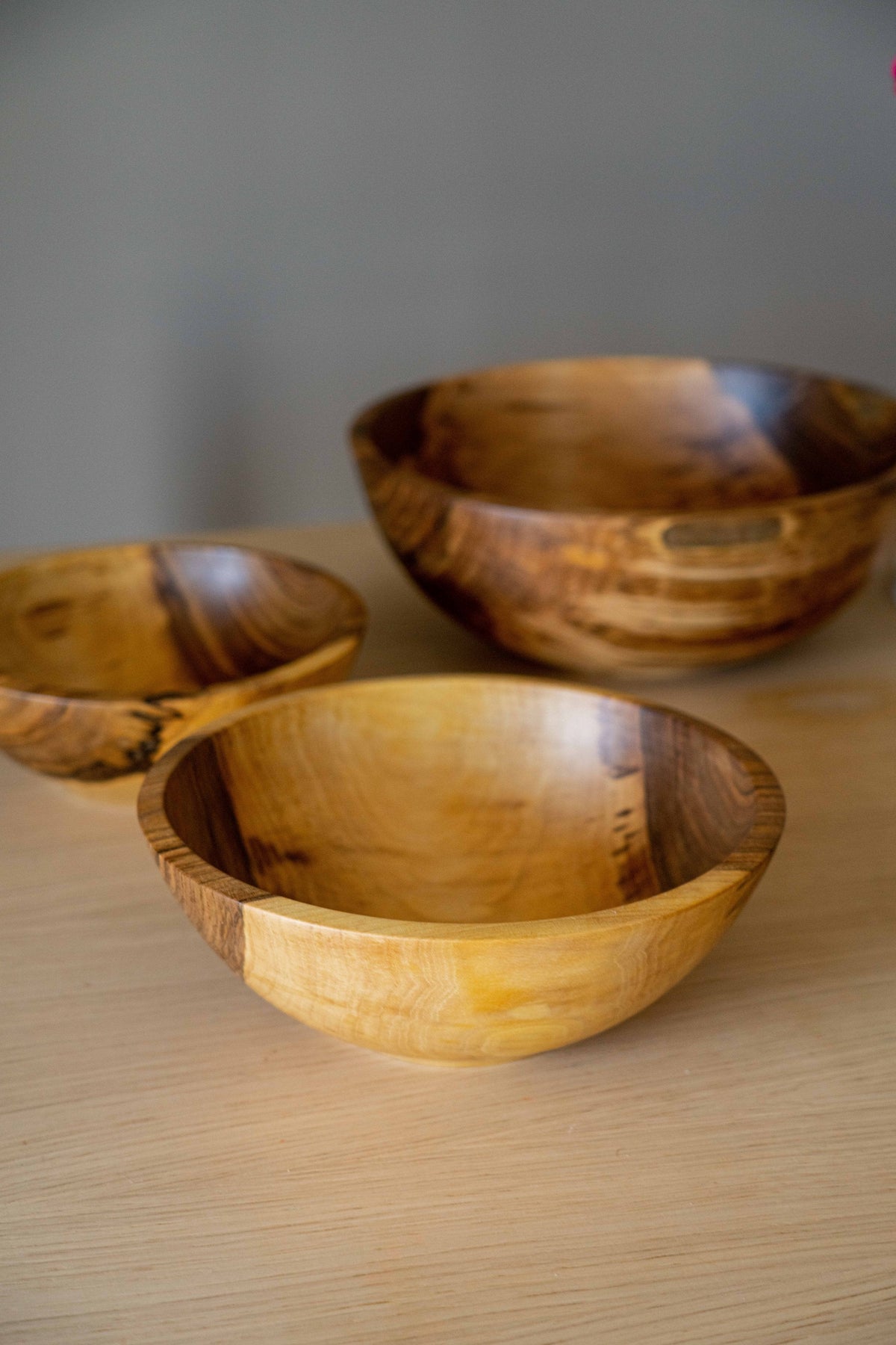 Hand carved walnut wood nesting bowl set with three sizes
