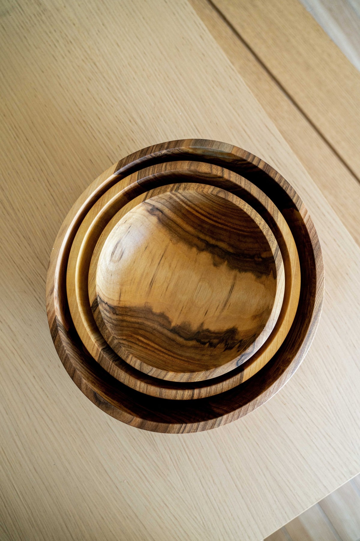 Hand carved walnut wood nesting bowls set of three sizes handcrafted in Ukraine with natural finish