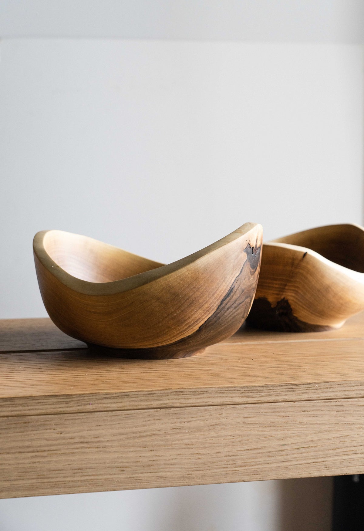 Hand carved small wooden walnut bowl with natural wood rings and oil finish