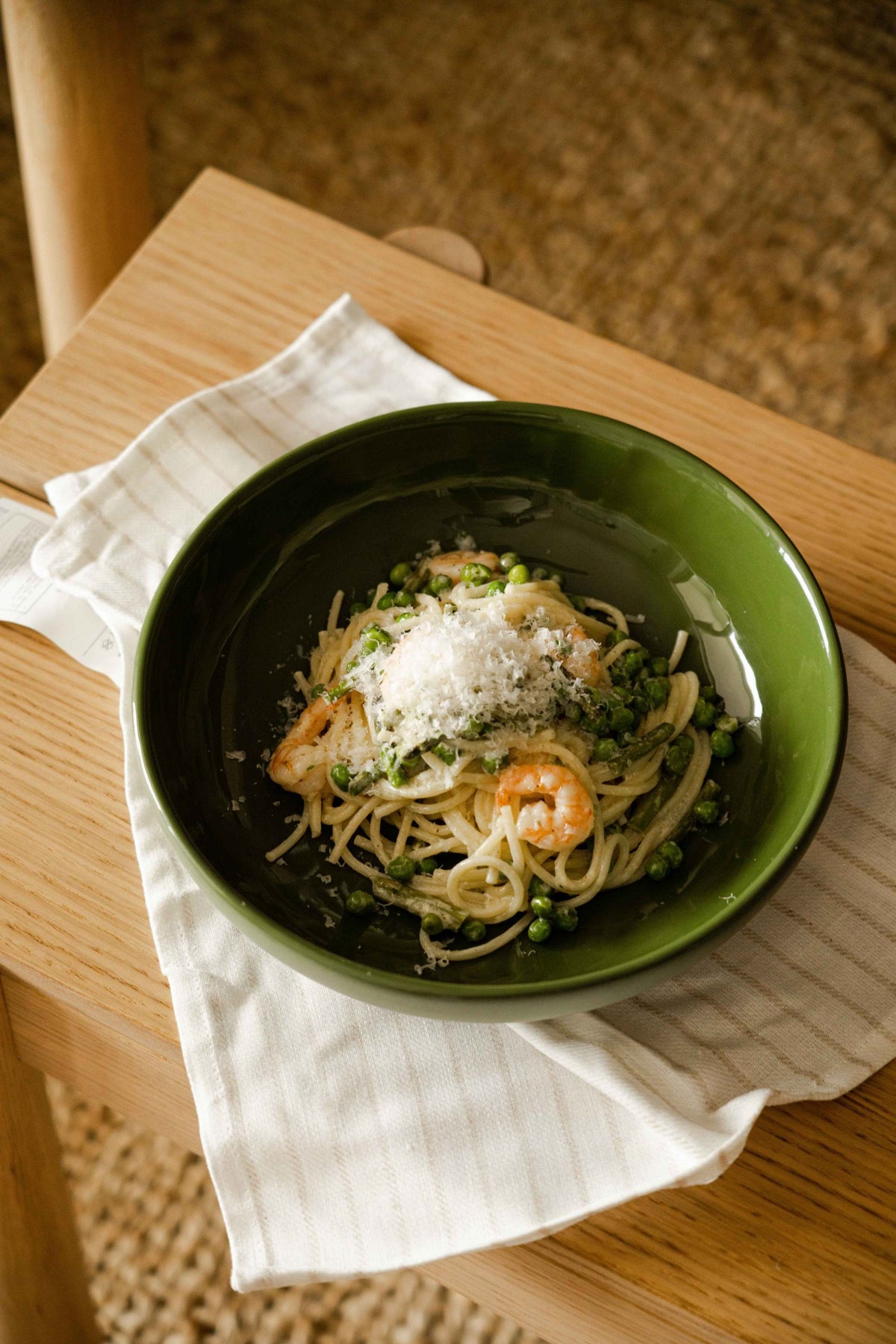 Handmade porcelain pasta bowl green with glossy glaze and unglazed exterior textured finish