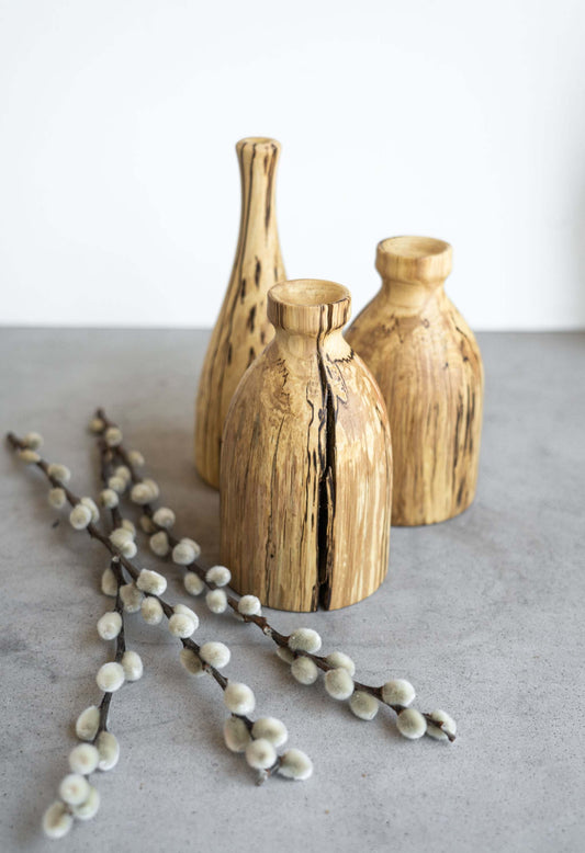 Handcrafted maple wood vase with smooth finish and natural grain patterns