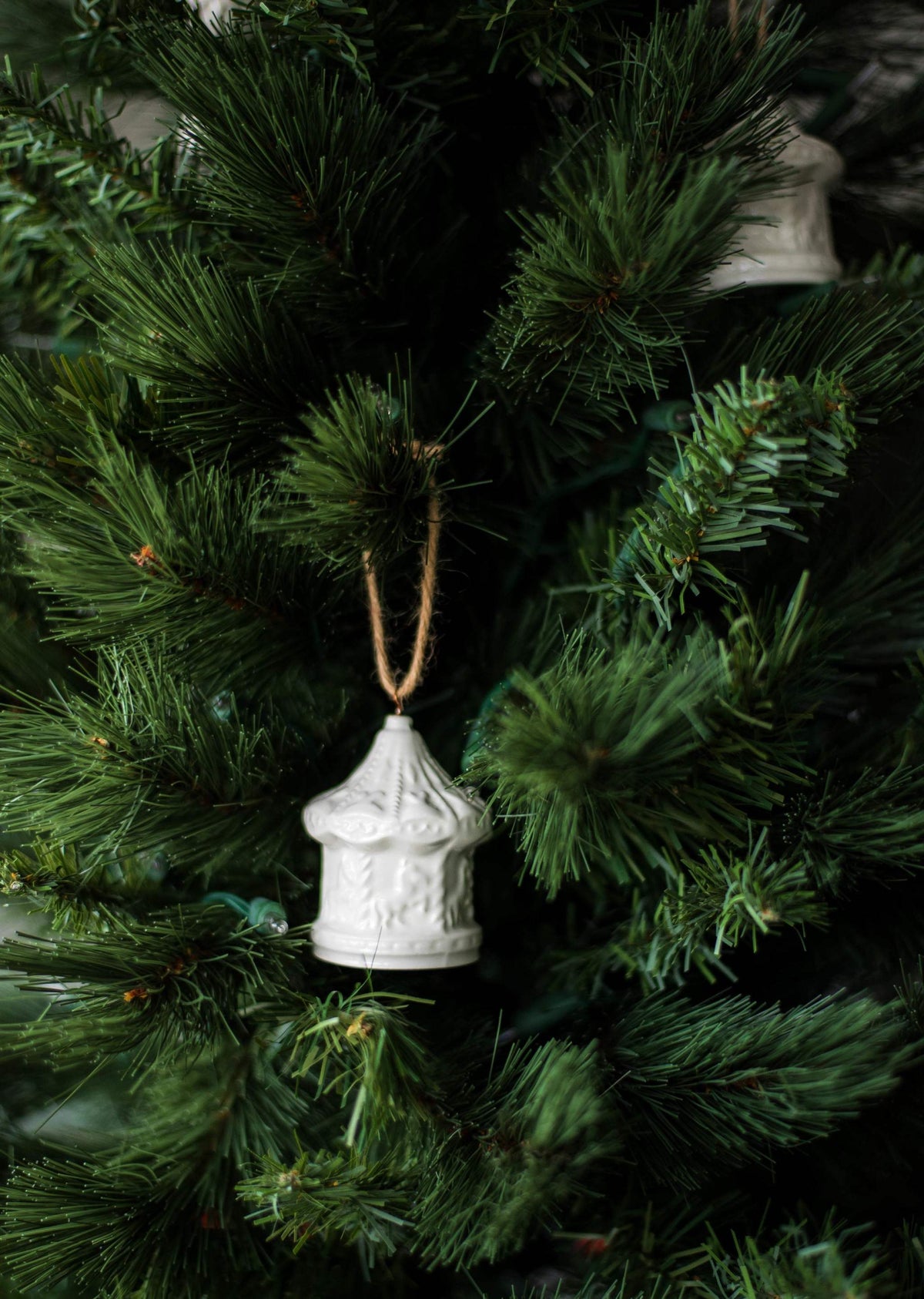 White handmade porcelain Christmas ornaments with jute loops, rustic holiday decor made in Ukraine