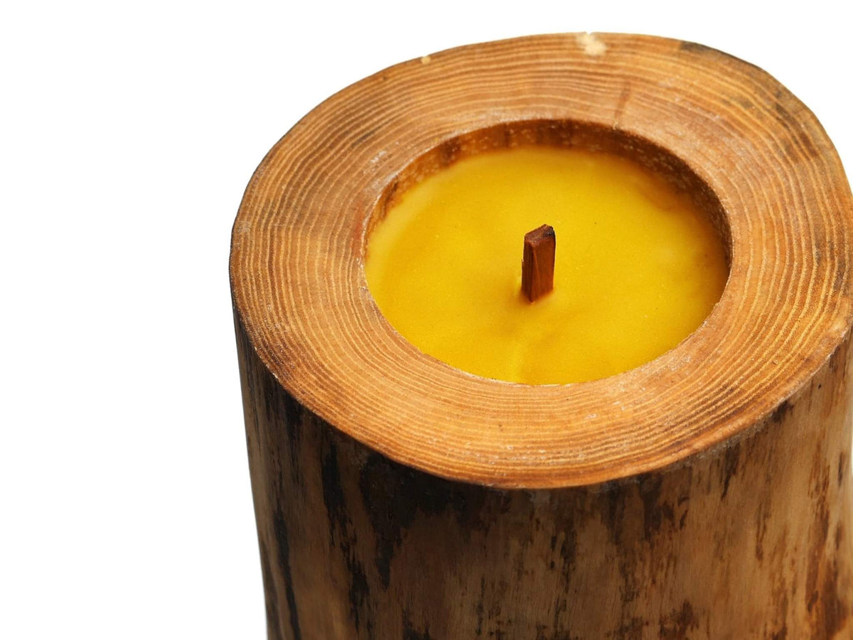 Hand Craft Ubud Wooden Candle in natural brown charred wood, with a golden beeswax fill and a single wooden wick.