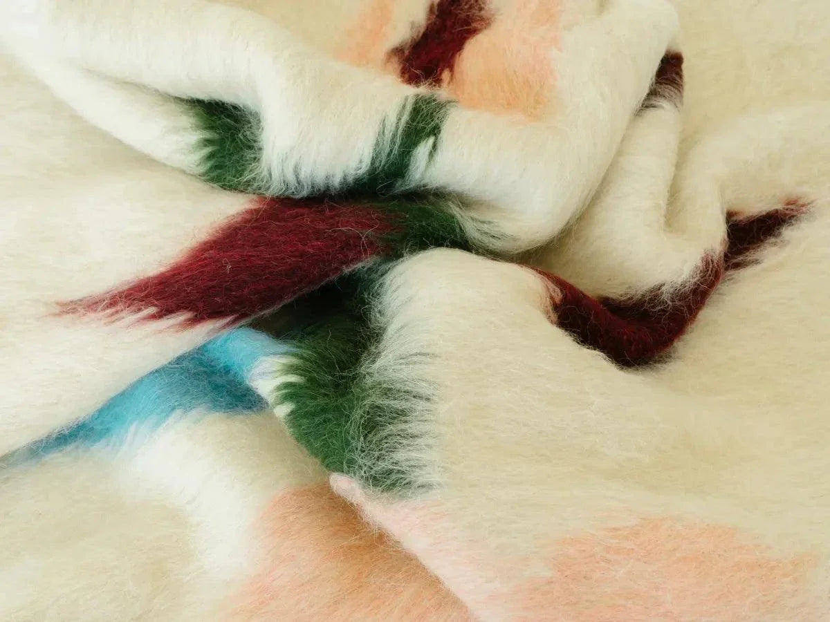 Multicoloured handwoven wool lizhnyk with brushed texture and delicate floral motif on cotton base