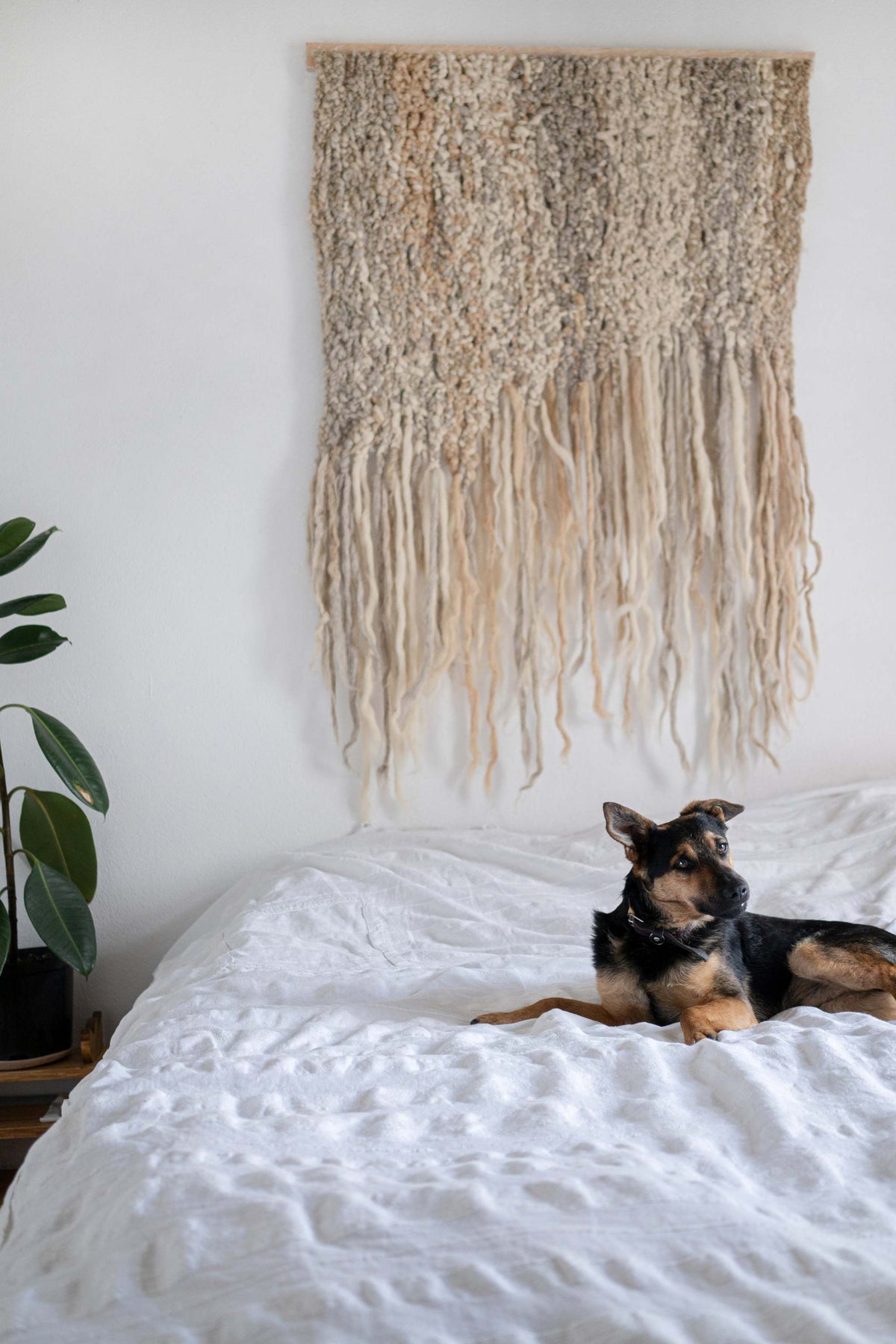 Handwoven wool wall hanging made from 100% sheep wool with textured neutral tones, crafted in Ukraine