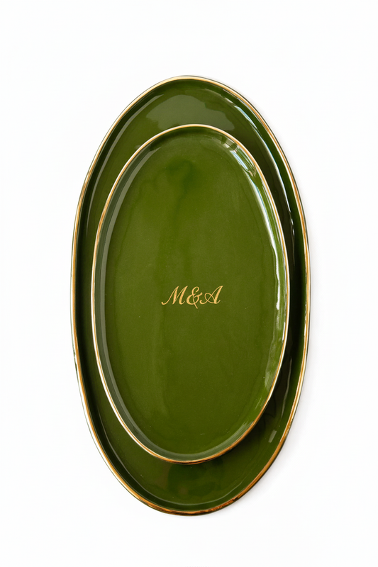 Personalized Wedding Platter, glossy olive-green ceramic serving tray with oval shape, gold rim, and gold initials in the center.
