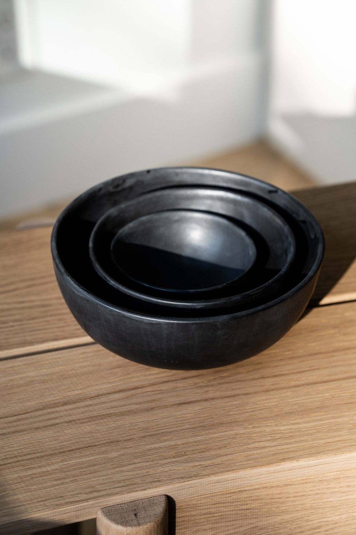 Stoneware black matte salad serving bowl with unique reactive glaze, handmade in Ukraine