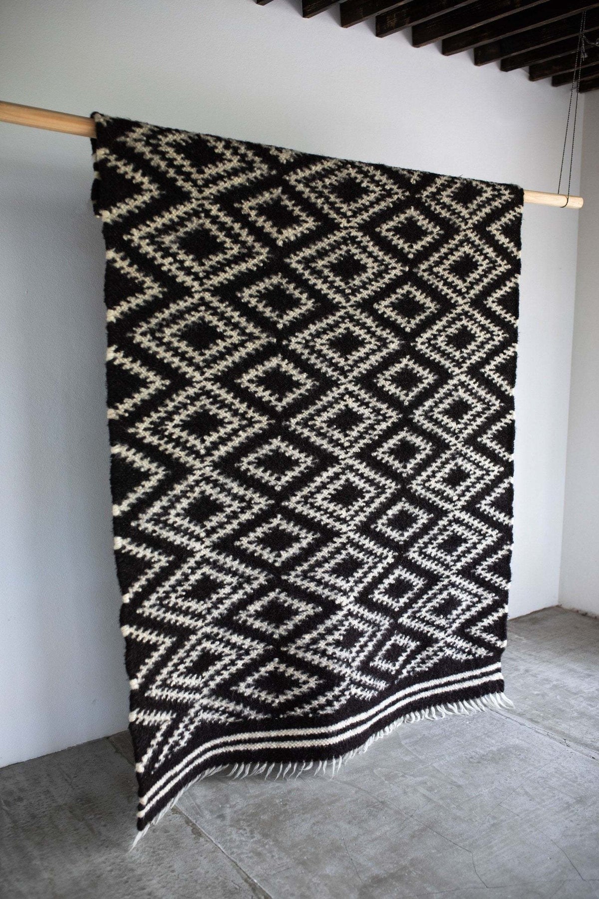 Traditional Carpathian wool lizhnyk with spectacled pattern handwoven on ancient loom