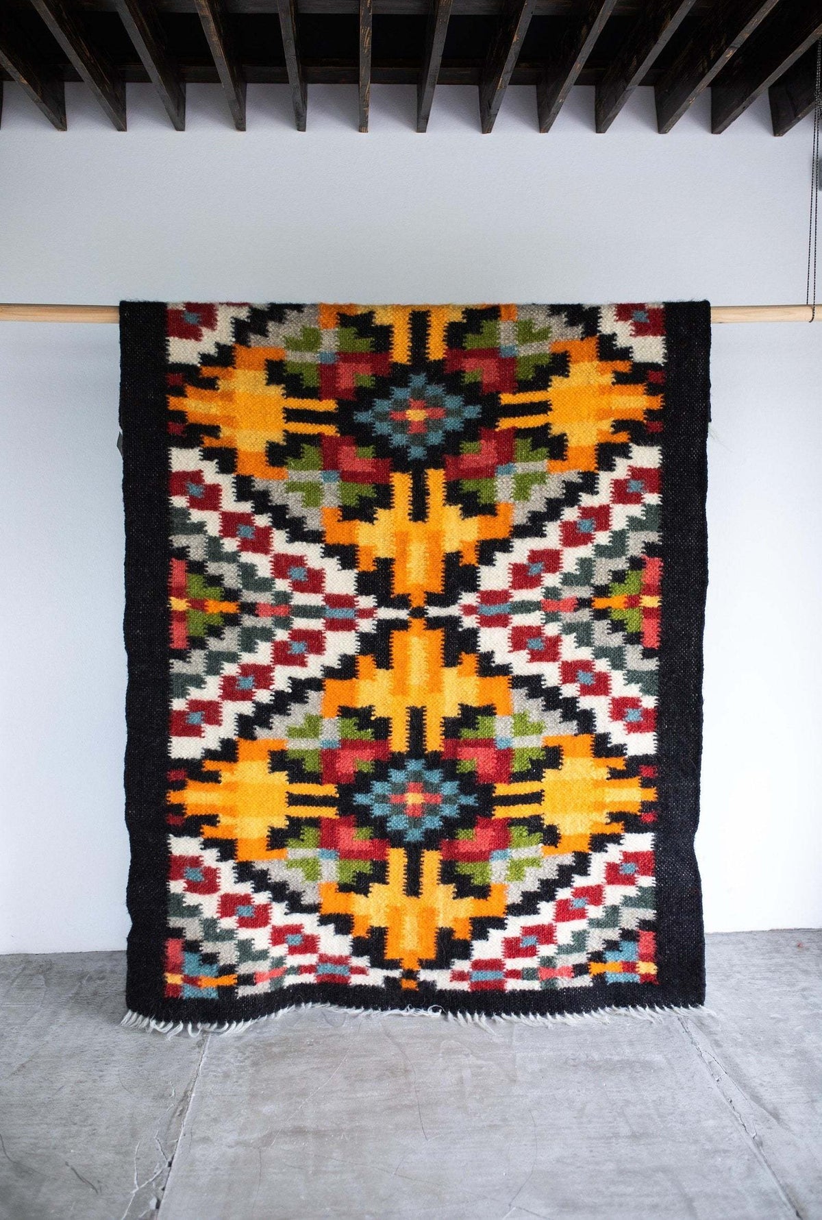 Traditional handwoven Carpathian wool lizhnyk rug with archival ornaments, 100% Carpathian sheep wool, handcrafted on an ancient loom, perfect for decorative accent or bedspread.