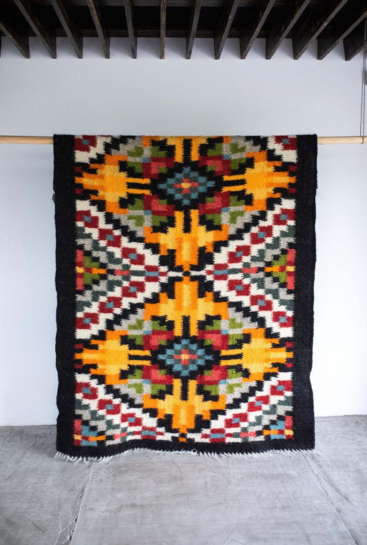 Traditional handwoven Carpathian wool lizhnyk rug with archival ornaments, 100% Carpathian sheep wool, handcrafted on an ancient loom, perfect for decorative accent or bedspread.