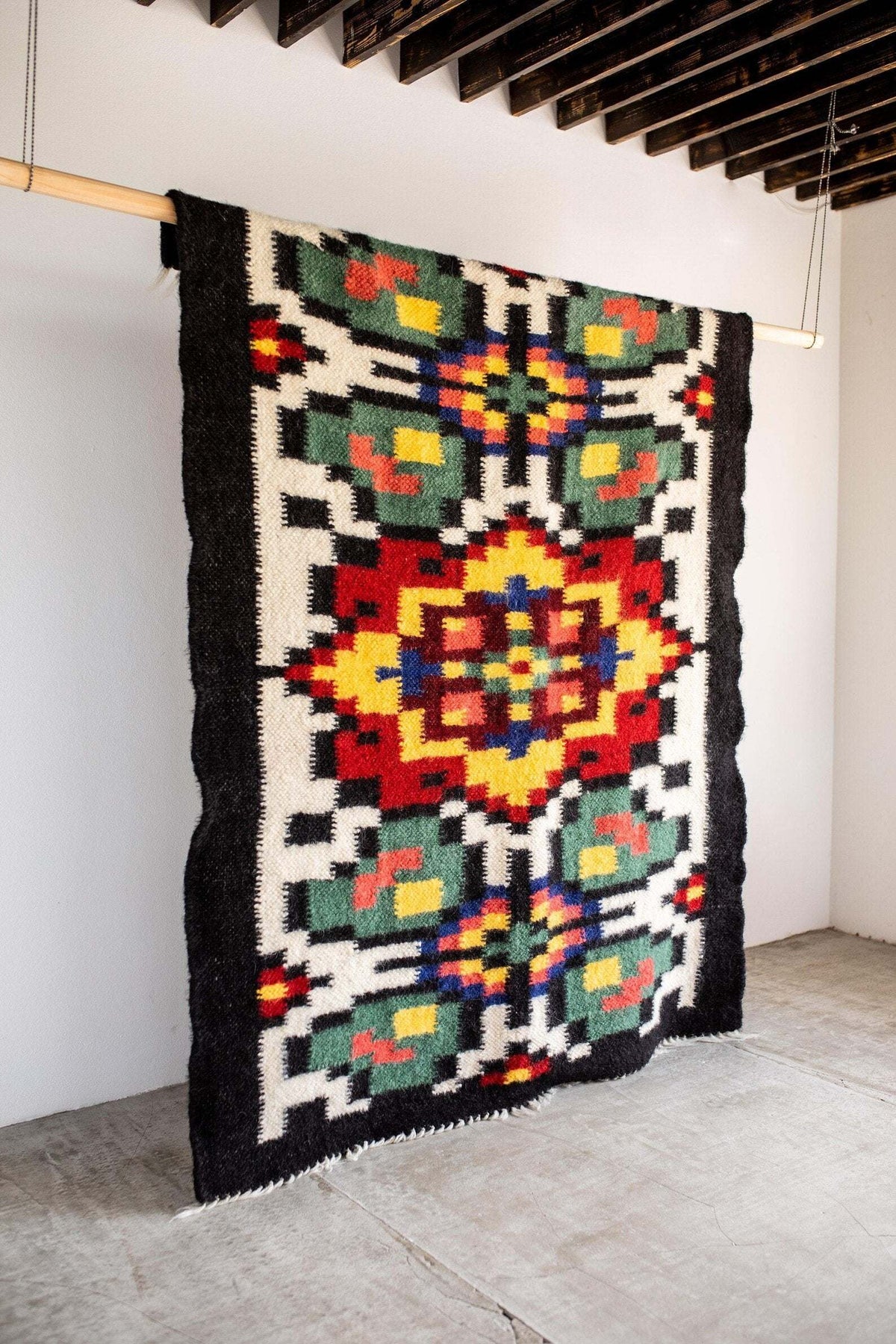 Handwoven Carpathian Wool lizhnyk rug with traditional mountain patterns and natural sheep wool texture