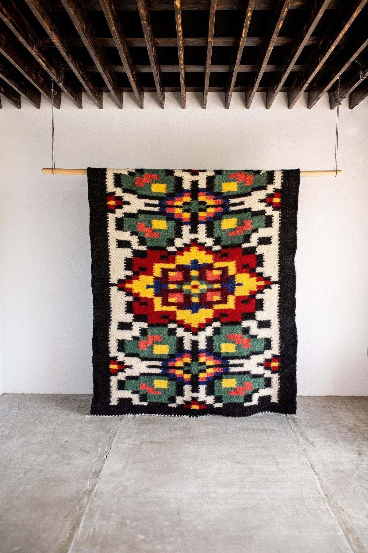 Handwoven Carpathian wool lizhnyk rug with traditional patterns and natural texture