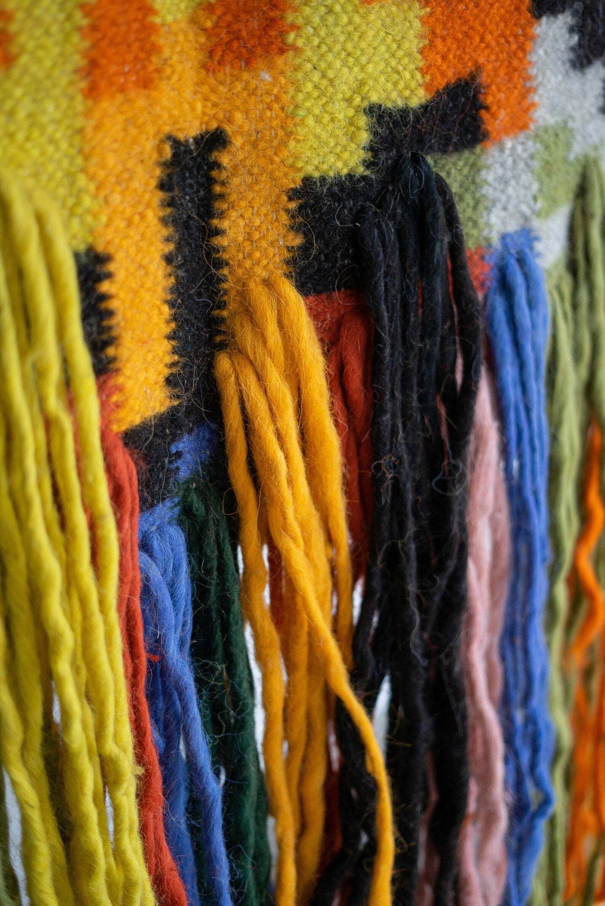 Traditional Carpathian wool wall hanging made of 100% sheep wool with handwoven patterns