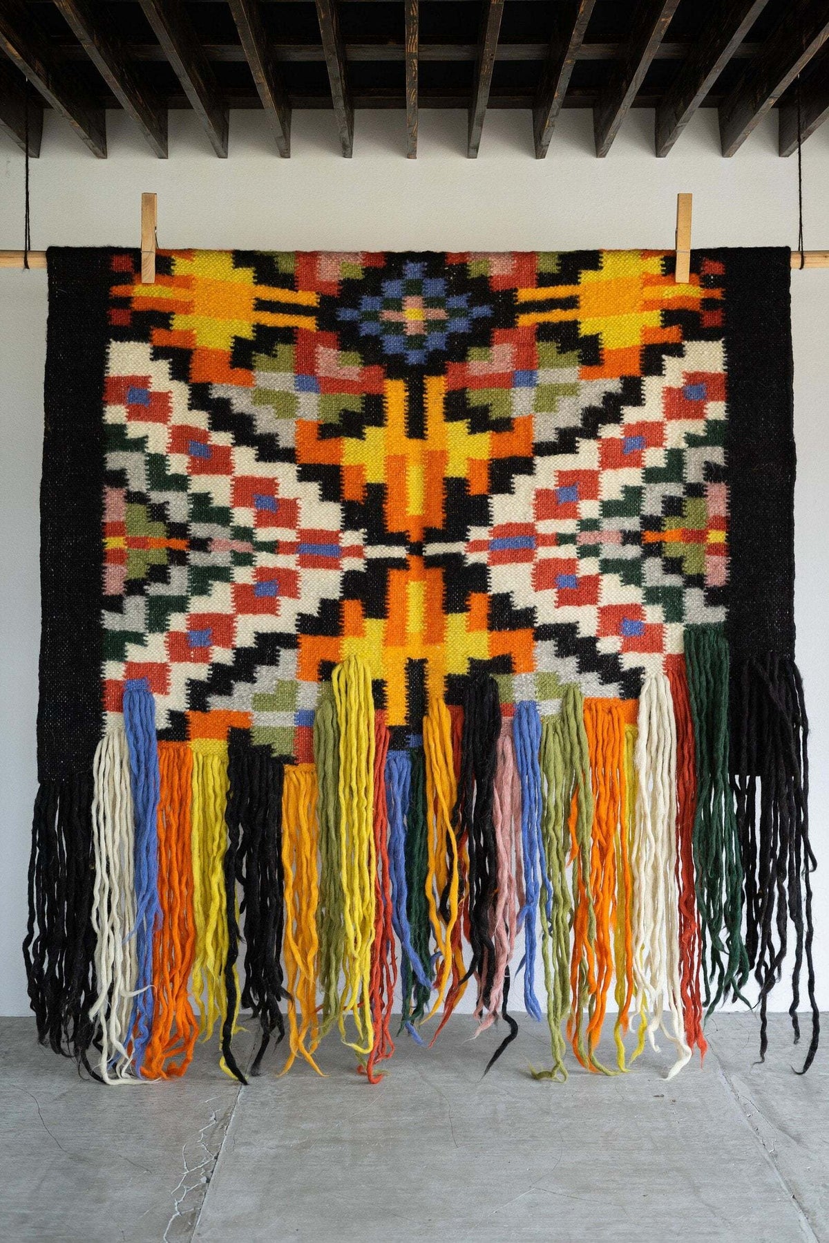 Traditional Carpathian wool wall hanging with intricate handwoven patterns