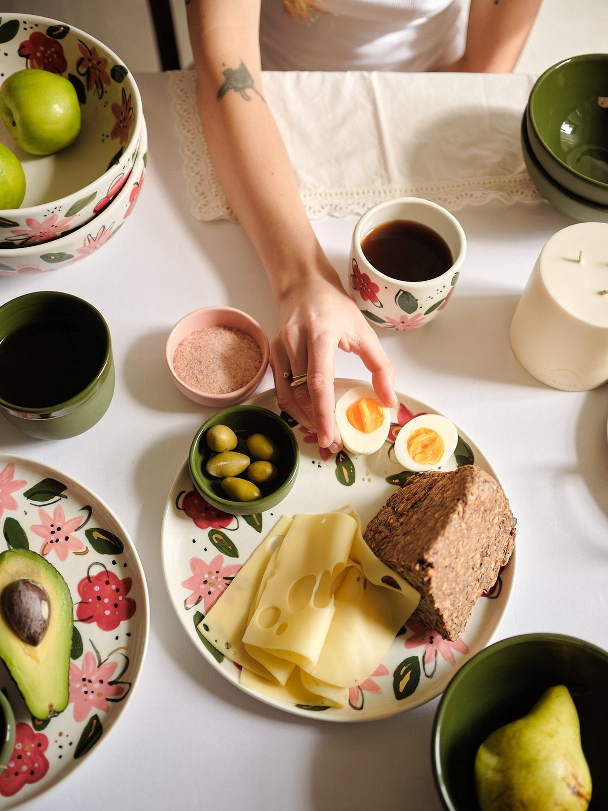 Hand-Painted Floral Dinner Plates, off-white porcelain with hand-painted pink flowers, red berries, green leaves, and gold accents.