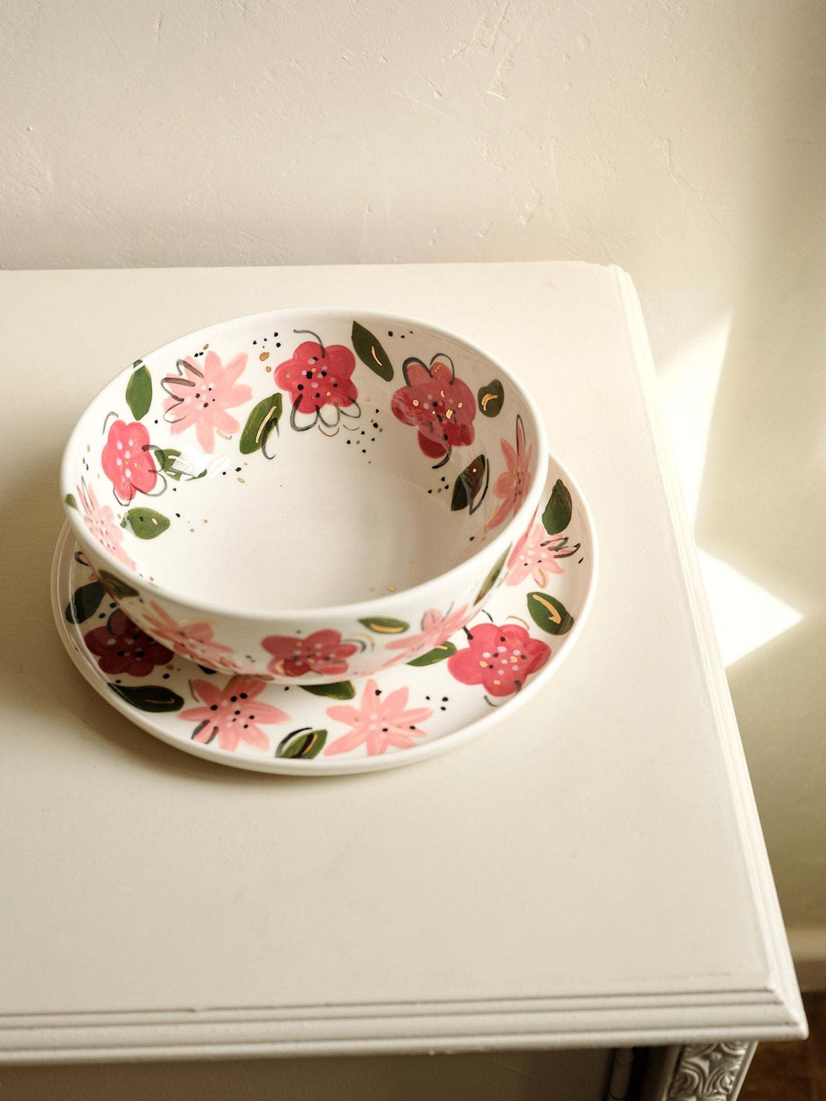 Hand-Painted Floral Salad Bowl in off-white porcelain, decorated with hand-painted pink and red flowers, green leaves and gold accents.