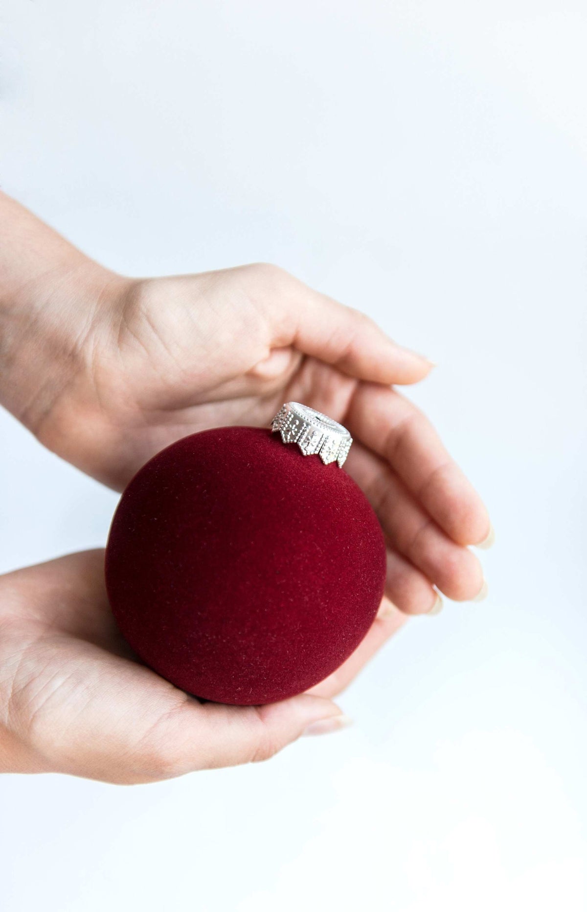 Porcelain velour Christmas ball ornament with silver cap and ribbon, handmade in Ukraine