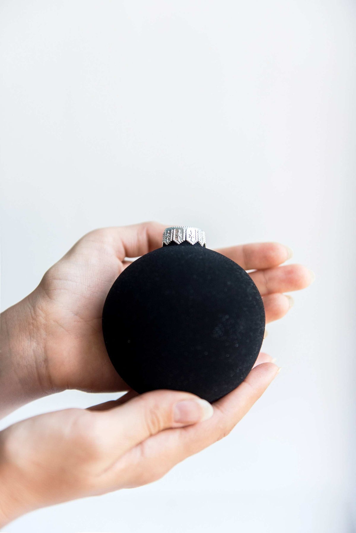Porcelain velour Christmas ball ornament with silver cap and ribbon, handmade in Ukraine